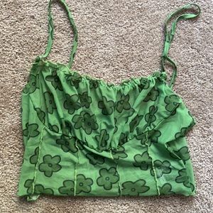 Green mesh cropped tank with flower print.